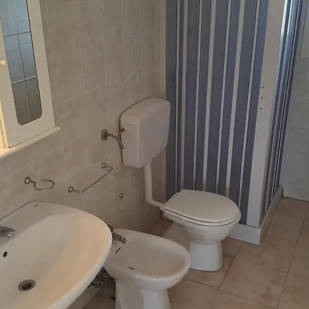 Piscina 24 Posti Letto Сasa de vacaciones Torre dell'Orso